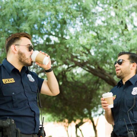 Two police officers discussing are PERA benefits taxable.